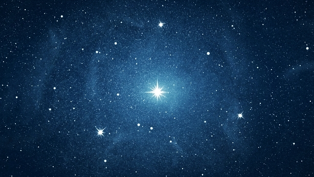 widescreen image of a stellar background